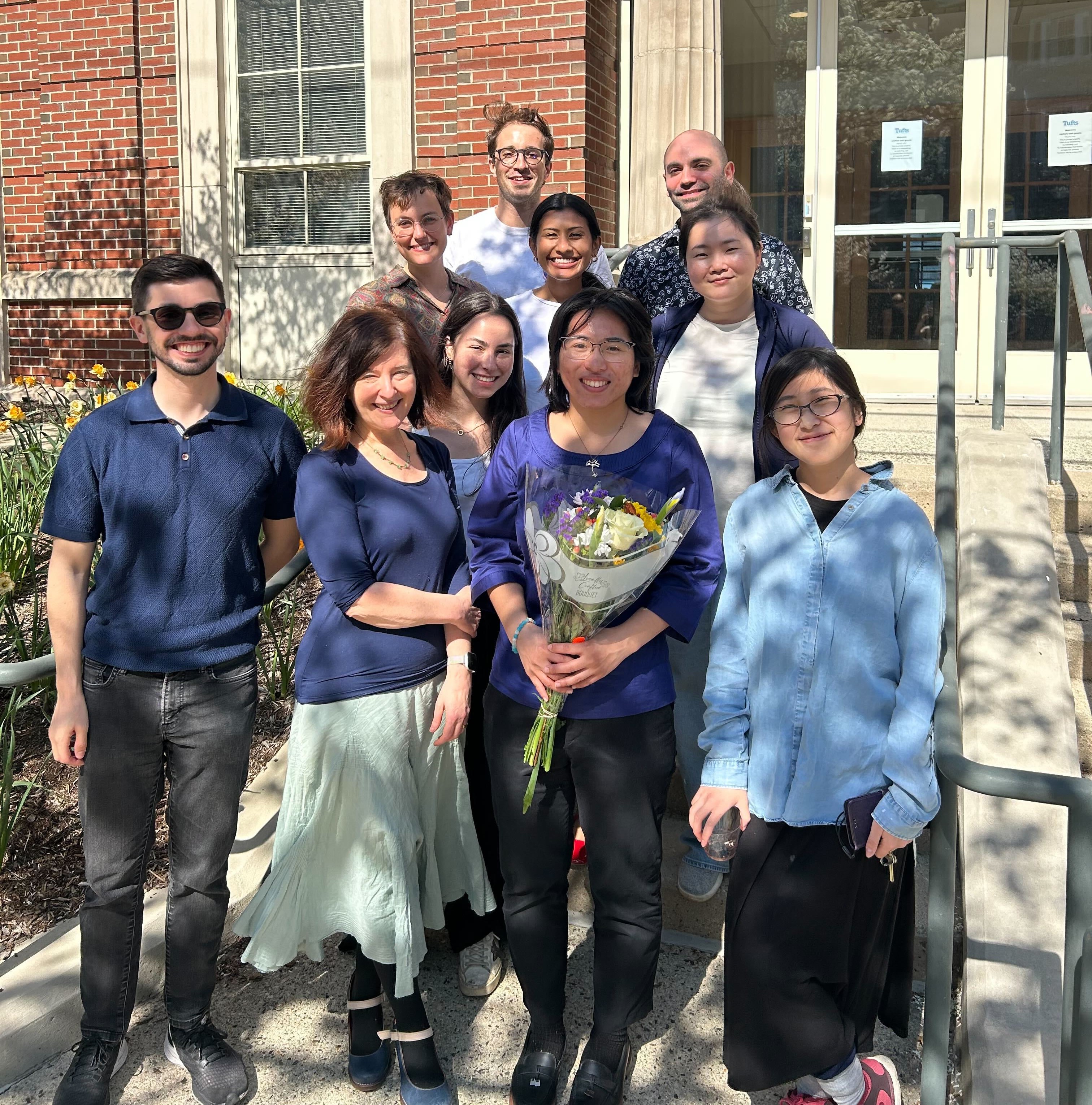 lab members gathered on Psychology Building front steps after Ivi's Senior Thesis defense