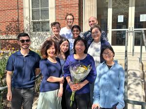 Lab members gathered on the steps of the Psychology building
